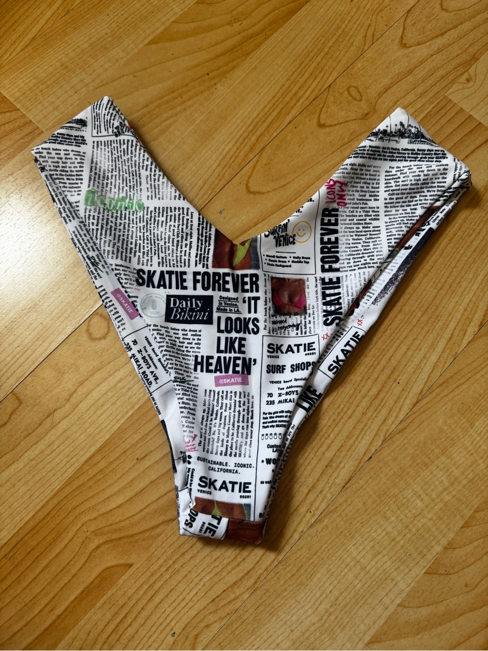 Skatie Mandi swim bottoms White Newspaper Print with Black Text